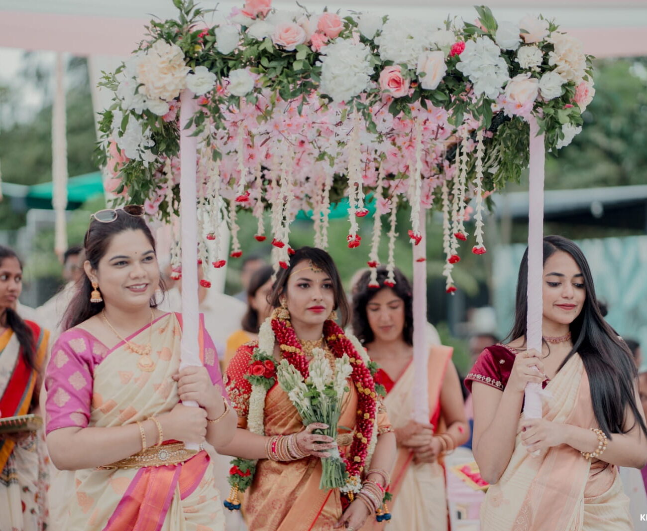 Bridal entry under Phoolon ki cheddar